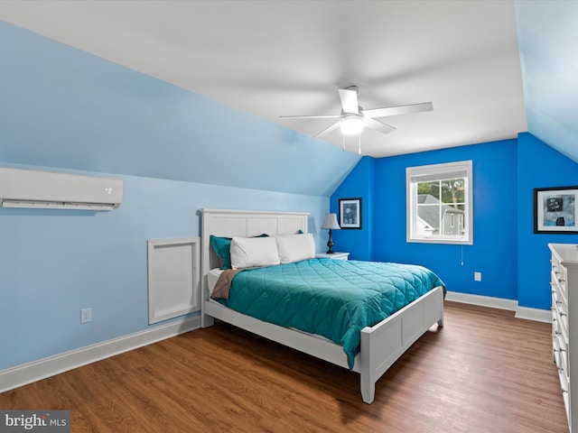 bedroom with ceiling fan, dark wood-type flooring, a wall mounted air conditioner, and lofted ceiling