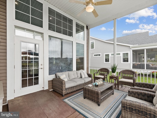 sunroom / solarium with ceiling fan