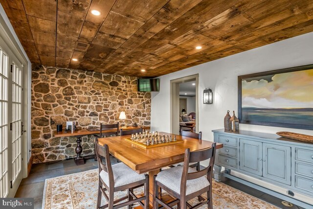 sitting room featuring lofted ceiling and hardwood / wood-style floors