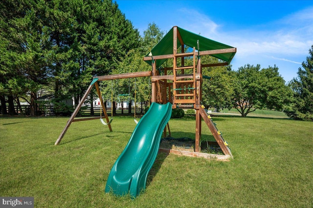 view of jungle gym with a yard