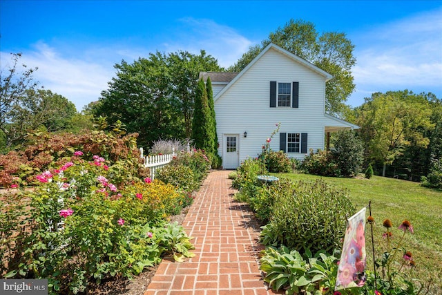 exterior space with a front yard