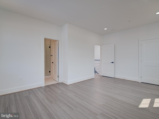 unfurnished bedroom featuring light hardwood / wood-style flooring