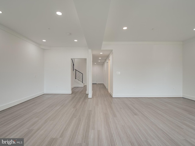 spare room featuring light wood-type flooring