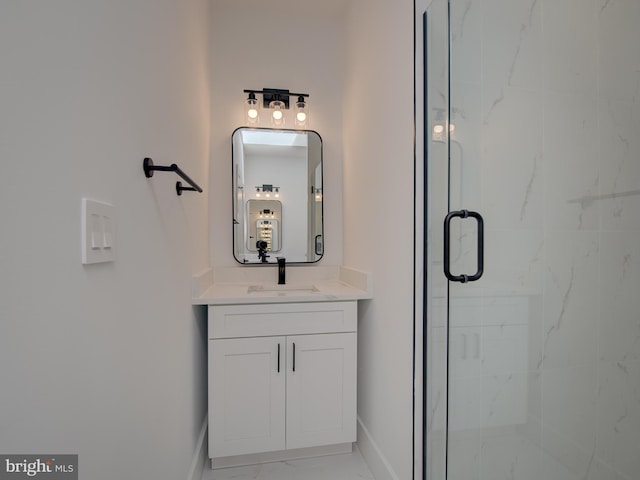 bathroom featuring tile patterned flooring, vanity, and a shower with shower door