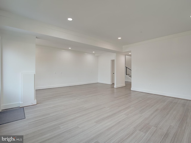 spare room with light hardwood / wood-style flooring