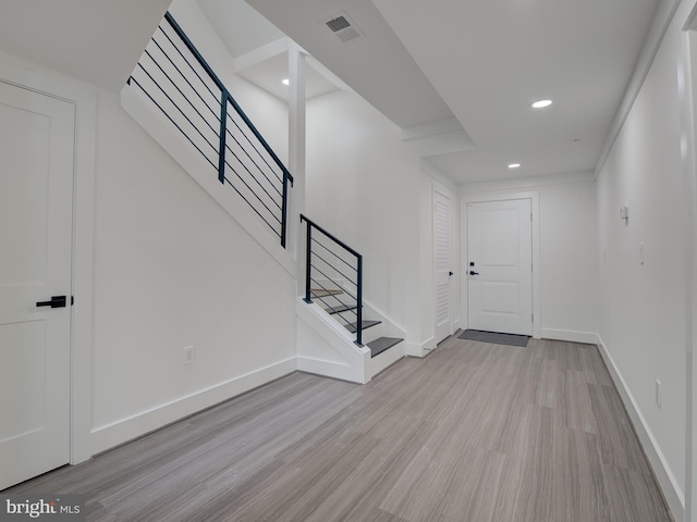 entrance foyer featuring light hardwood / wood-style floors