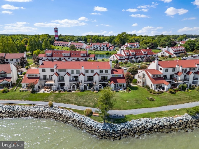 aerial view featuring a residential view and a water view