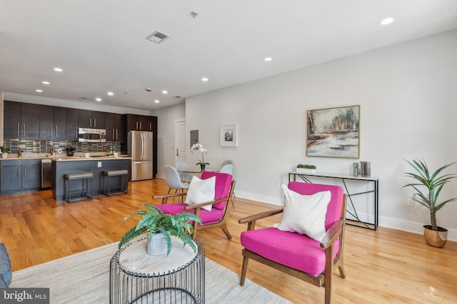 living room featuring light hardwood / wood-style floors