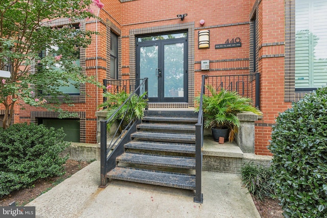 entrance to property featuring french doors