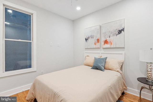 bedroom featuring light hardwood / wood-style floors