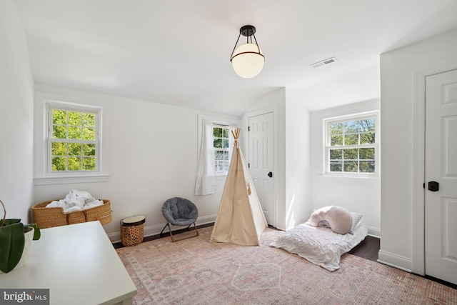 rec room with lofted ceiling