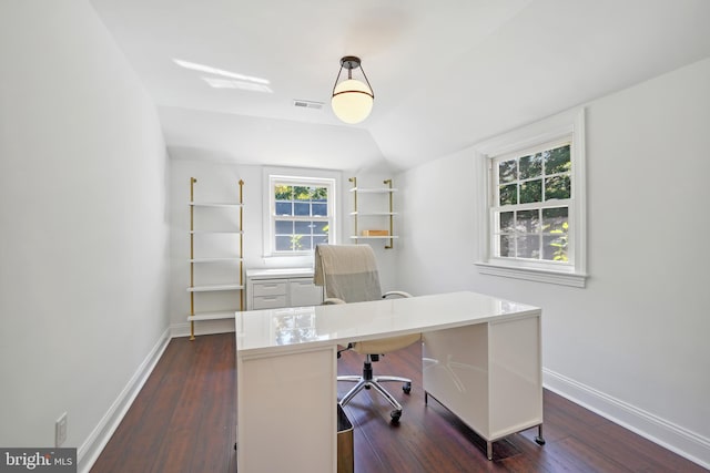 office space with dark hardwood / wood-style floors and vaulted ceiling