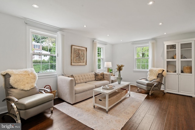 living room featuring dark wood finished floors and recessed lighting