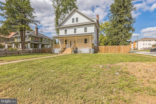 view of front of house featuring a porch and a front lawn