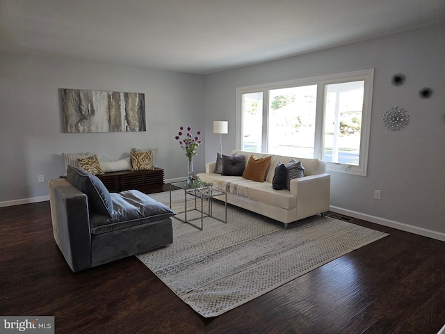 living room featuring dark hardwood / wood-style floors