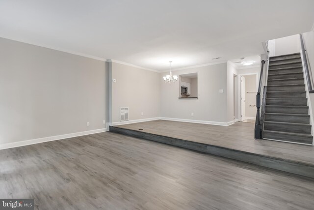 unfurnished bedroom with connected bathroom and light hardwood / wood-style floors