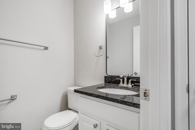 bathroom with vanity, wood-type flooring, and shower / bathtub combination