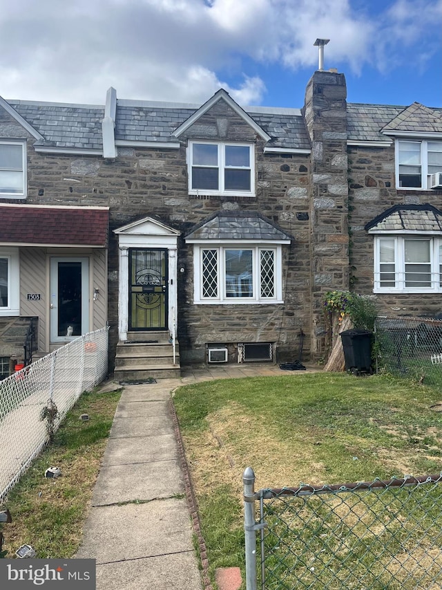 view of property with a front lawn