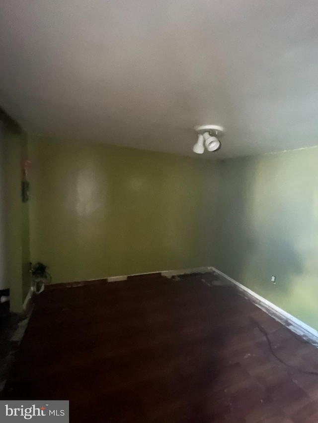 bonus room with hardwood / wood-style floors