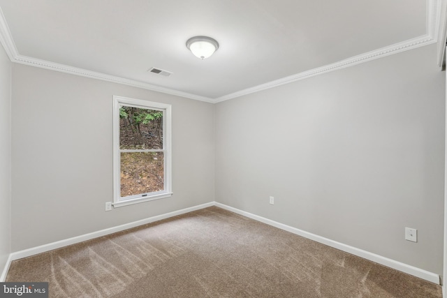 carpeted empty room with ornamental molding