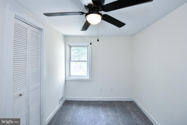 unfurnished bedroom with a closet, ceiling fan, and carpet