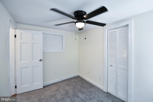 unfurnished bedroom with a closet, ceiling fan, and carpet