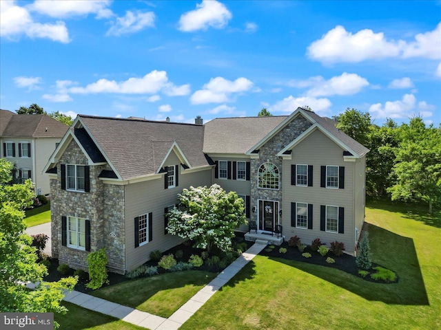 view of front of house featuring a front yard