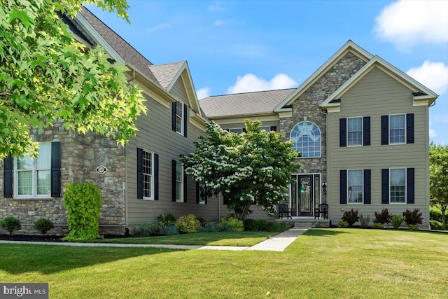 view of front of house with a front lawn