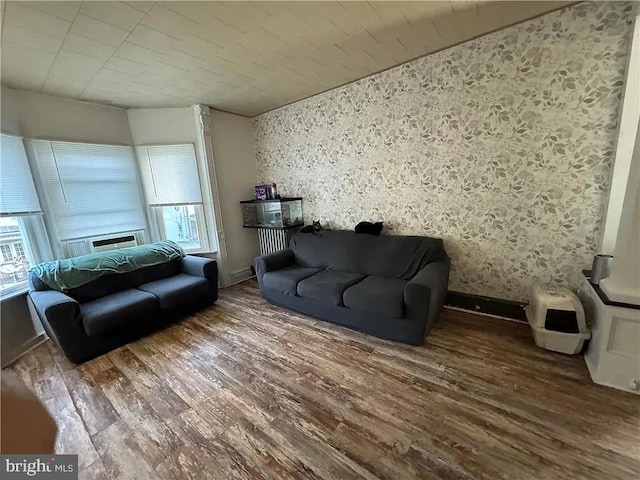 living room featuring dark wood-type flooring