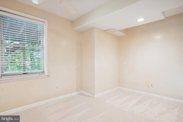 unfurnished room featuring recessed lighting, baseboards, light carpet, and a ceiling fan