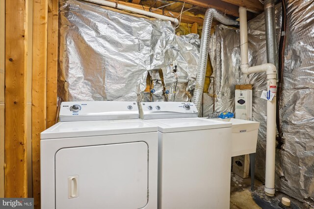 laundry room with laundry area and separate washer and dryer