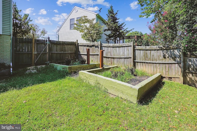 view of yard featuring a fenced backyard