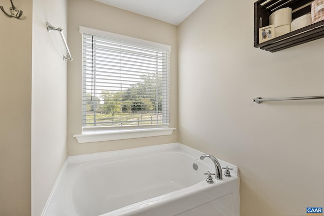 bathroom with a tub