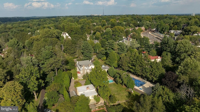 aerial view featuring a view of trees