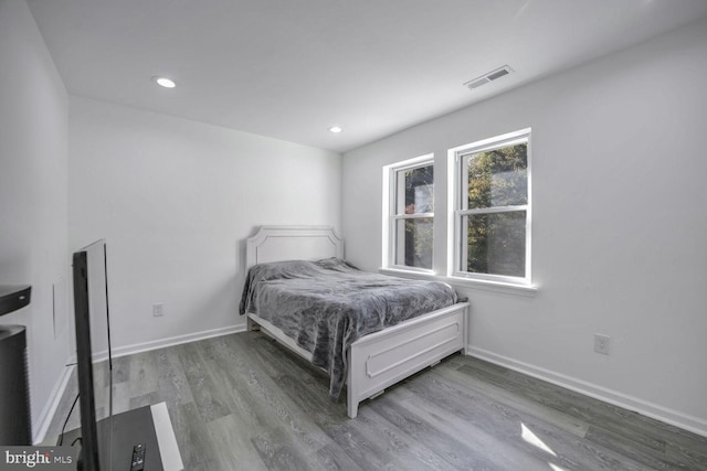 bedroom featuring wood-type flooring