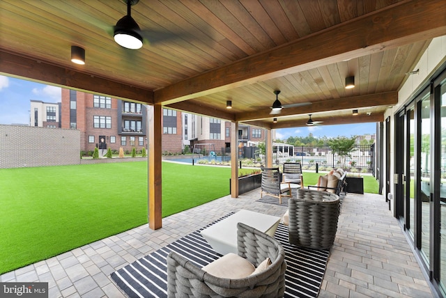 view of patio / terrace featuring ceiling fan