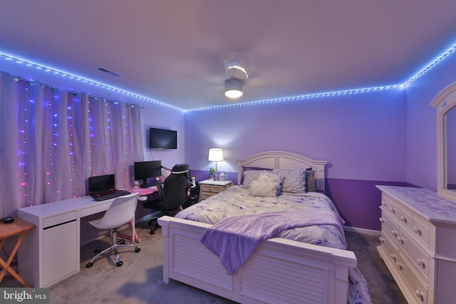 carpeted bedroom featuring ceiling fan