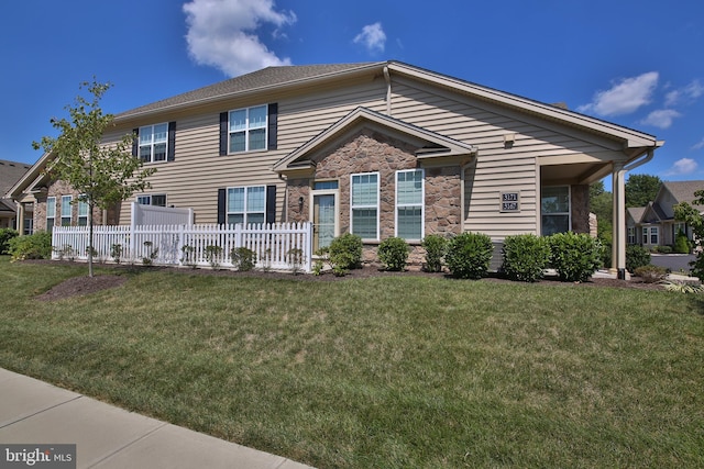 view of front facade with a front lawn