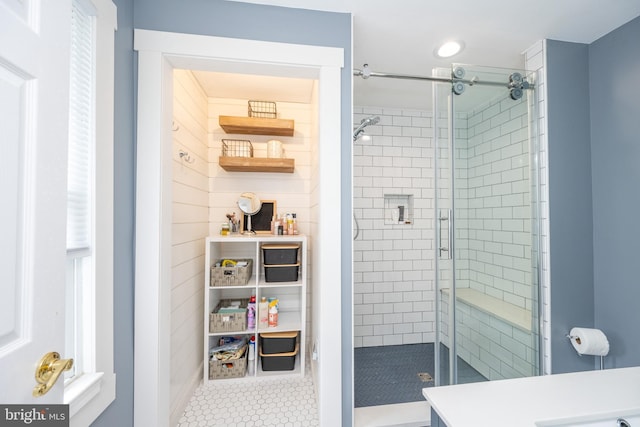 bathroom with a shower stall