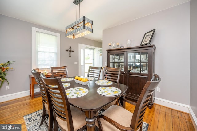 dining area with light wood-type flooring