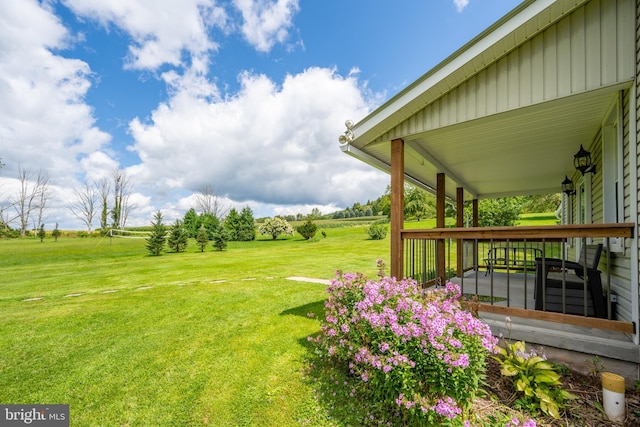 view of yard with a rural view