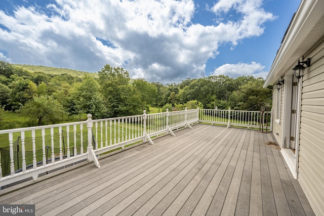 deck featuring a yard