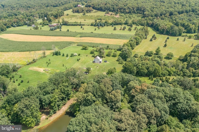 drone / aerial view featuring a rural view and a water view