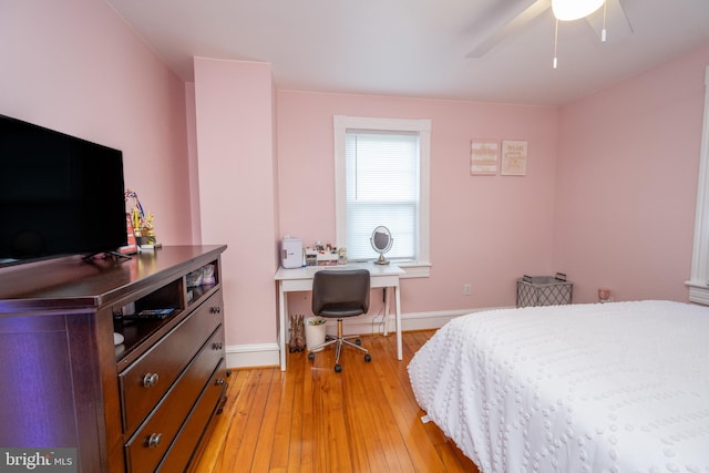 bedroom with light wood-type flooring and ceiling fan