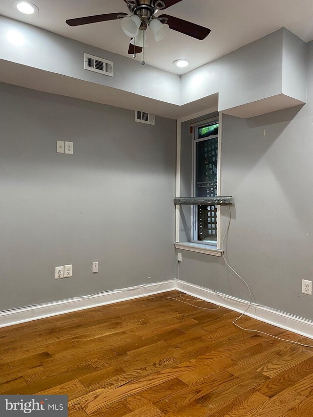 stairway featuring wood-type flooring