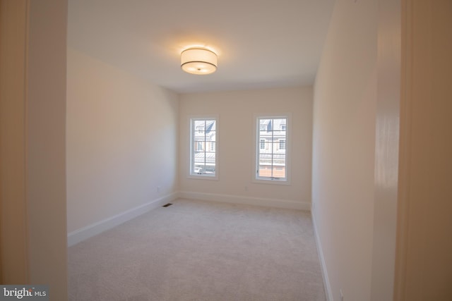 view of carpeted spare room