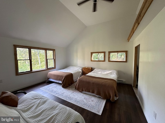 bedroom with dark wood-type flooring, ceiling fan, and lofted ceiling