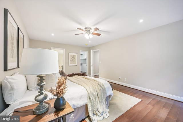 bedroom with dark wood-type flooring and ceiling fan