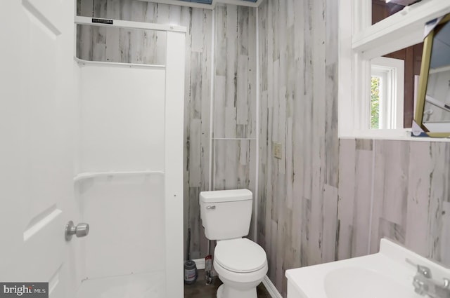 bathroom featuring toilet