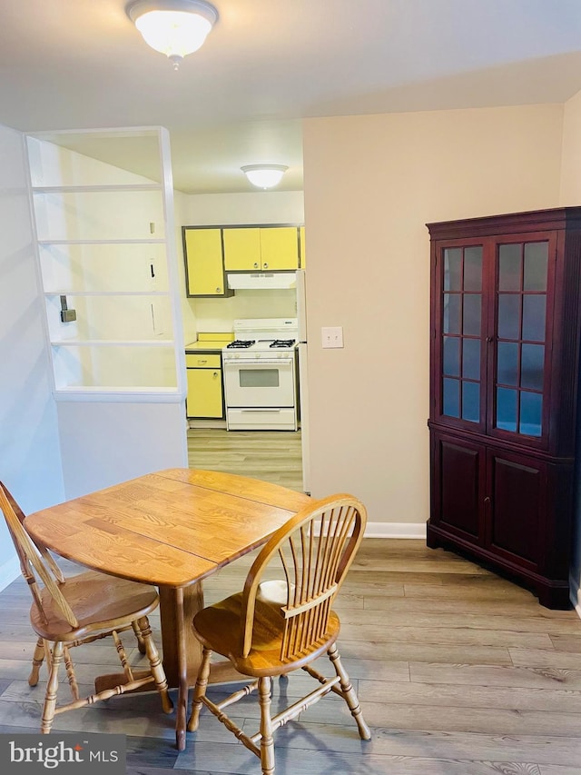 dining area with light hardwood / wood-style flooring